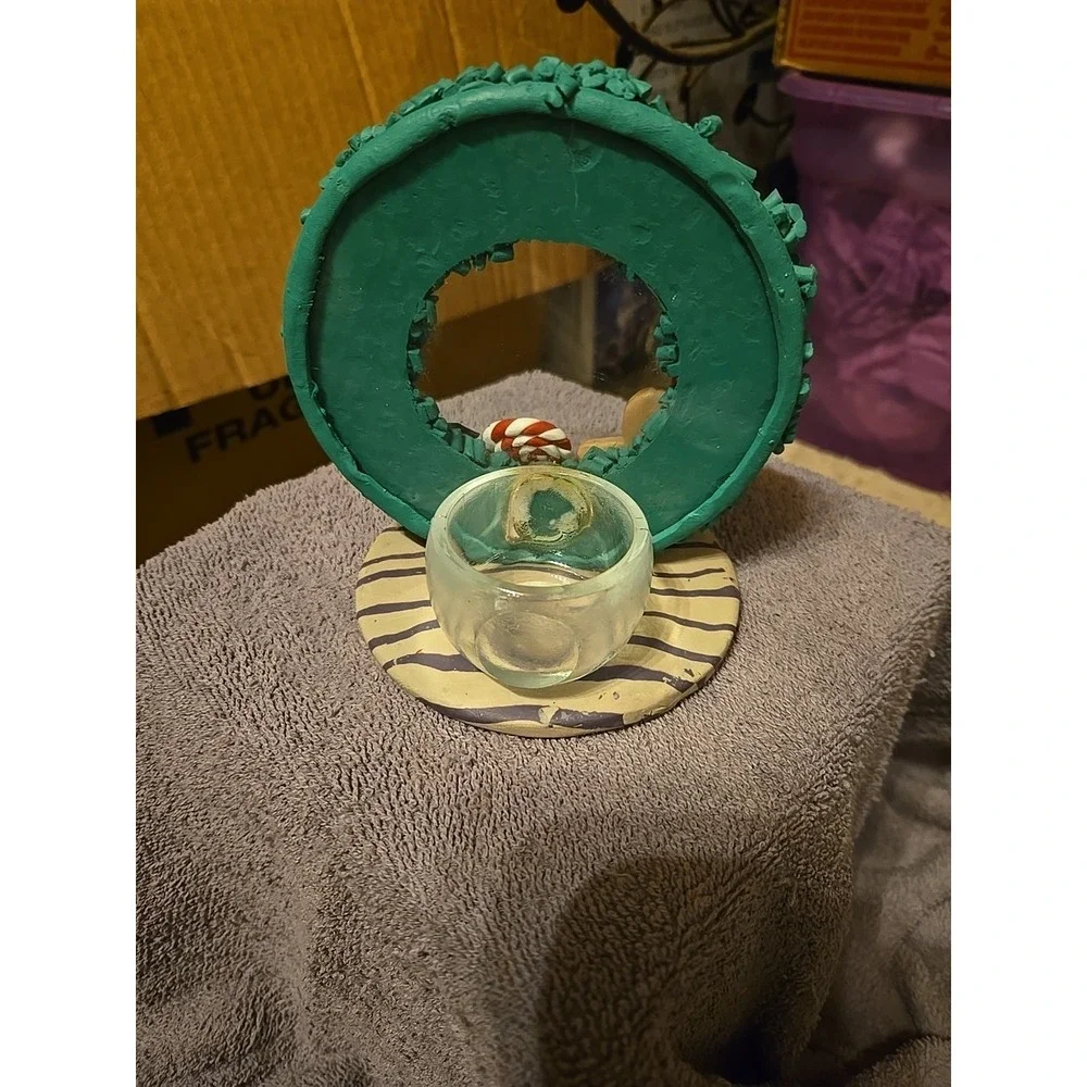Christmas-themed candle‎ holder